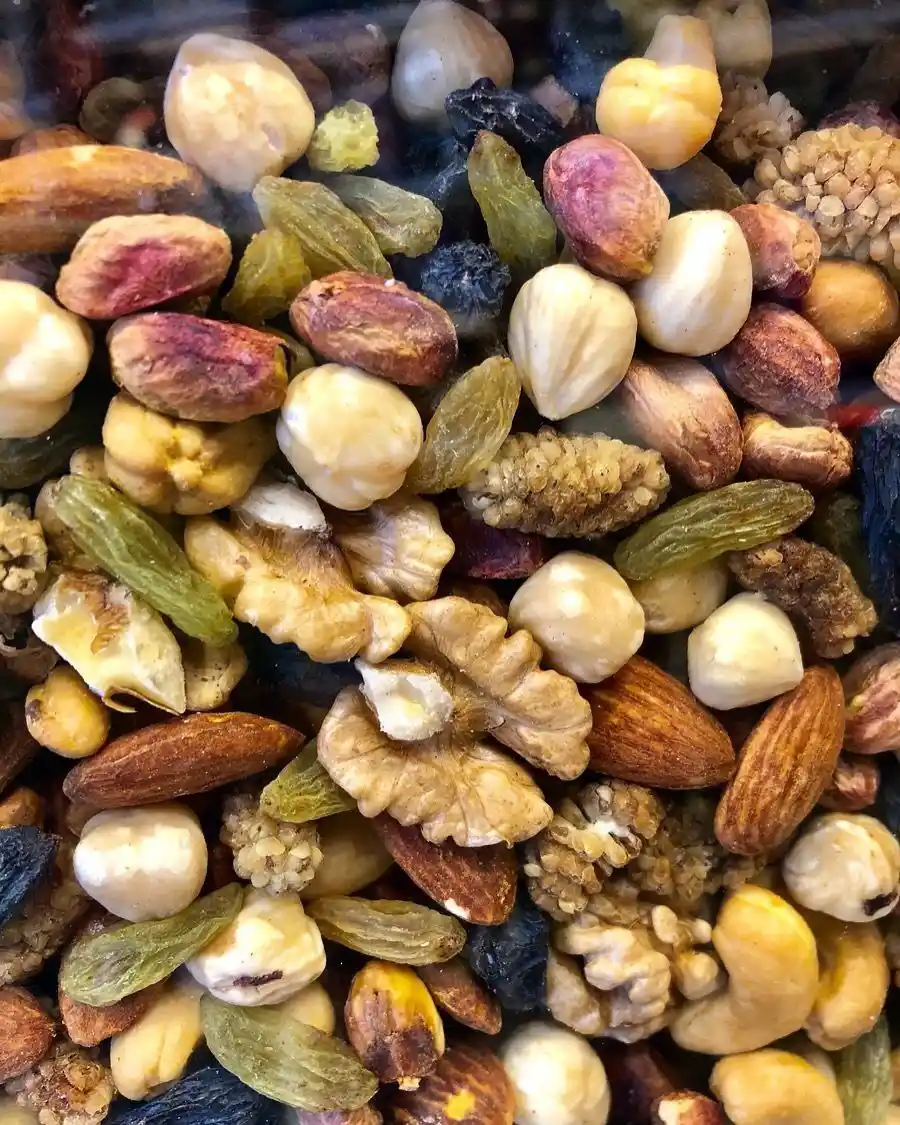 Close-up selection of mixed nuts, raisins and dried fruits